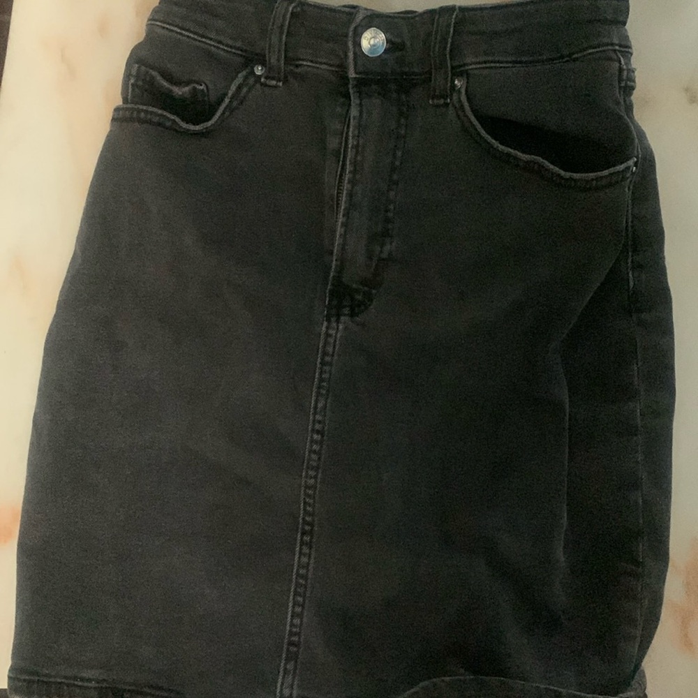 I am selling a cute bodycon black denim skirt!!